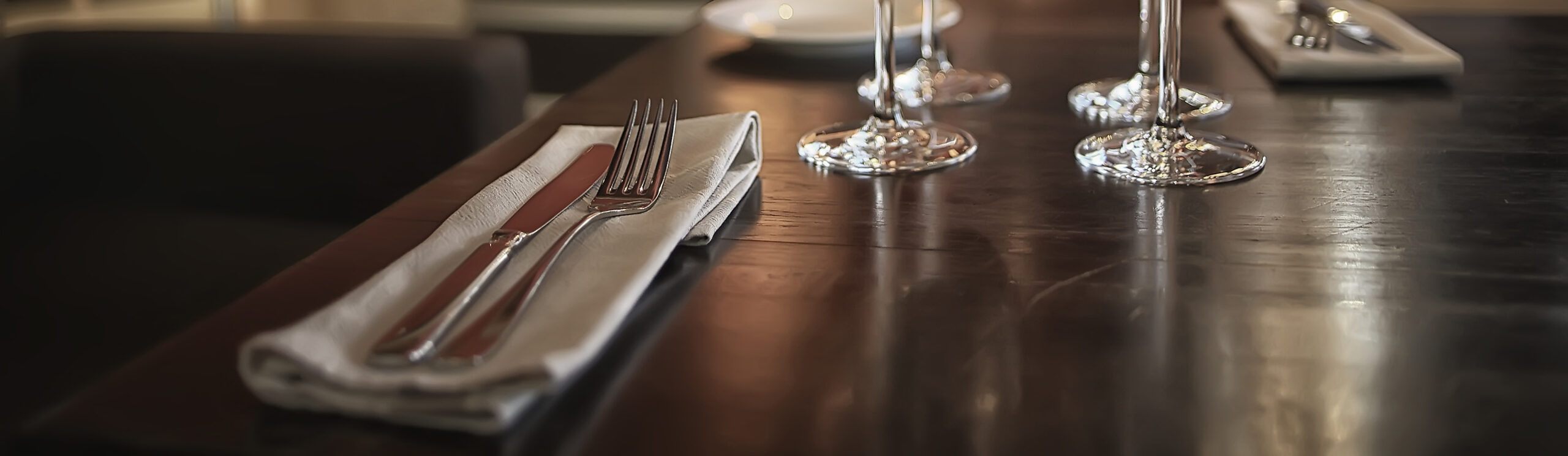 fork and knife serving in the interior of the restaurant / table in a cafe, food industry catering, menu